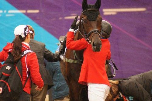 Photo of Jessica hugging tucker at the 2012 Olympic Games